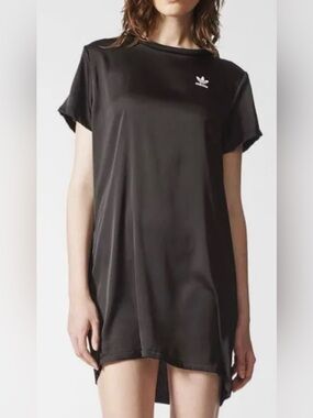 Adidas athletic style dress with pleated back panel. Like new